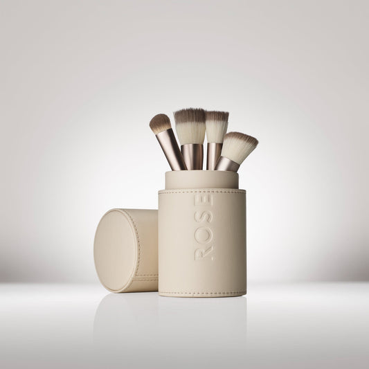 Signature Rose Inc Vegan Leather Brush Cup in a cylinder shape. Perfectly holds are your makeup brushes upright for optimal storage.
