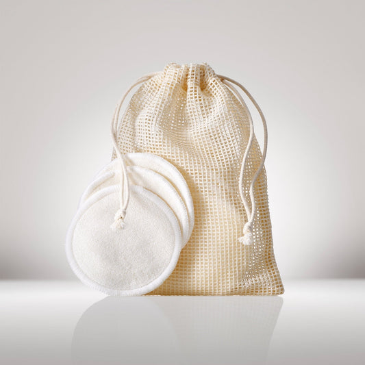 10 pack of Reusable Cotton Rounds in a mesh drawstring bag